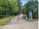 Inviting entrance to the greenway trail, offering a peaceful escape into nature for residents at 1008 Justice Walk Ave, Morrisville, NC 27560