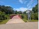 Scenic greenway trail featuring a wooden bridge and lush landscaping for outdoor enjoyment and recreation at 1008 Justice Walk Ave, Morrisville, NC 27560
