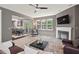 The living room offers views of the kitchen, dining room, and sunroom at 1008 Justice Walk Ave, Morrisville, NC 27560