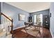 Comfortable office with hardwood floors, blue walls, and lots of natural light at 1008 Justice Walk Ave, Morrisville, NC 27560