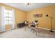 Inviting home office space with ample natural light and neutral carpeting at 1008 Justice Walk Ave, Morrisville, NC 27560