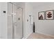 Modern shower with glass enclosure, tile floors, and a convenient towel rack at 1008 Justice Walk Ave, Morrisville, NC 27560