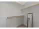 This closet features carpet flooring, shelving, and a mirror at 1027 Holden Rd, Youngsville, NC 27596