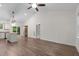 Open-concept living area with a vaulted ceiling and door to the outside at 1027 Holden Rd, Youngsville, NC 27596