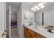 Bathroom featuring a sink and entrance to another bedroom at 10404 Dapping Dr, Raleigh, NC 27614