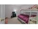 bedroom featuring a bunkbed, television, and playful decor at 10404 Dapping Dr, Raleigh, NC 27614