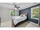 Cozy bedroom featuring a stylish bed, ceiling fan, and plenty of natural light at 105 Choyce Ct, Garner, NC 27529