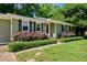 Inviting home exterior with manicured shrubs and a well-kept grassy lawn at 105 Choyce Ct, Garner, NC 27529