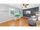 Bright living room featuring hardwood floors, modern decor and windows at 105 Choyce Ct, Garner, NC 27529