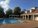Outdoor community pool features a spacious deck with an open-air lounge, perfect for relaxation at 105 Pink Dogwood Ln, Mebane, NC 27302