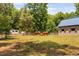Well-maintained barn with a fenced pasture, providing an ideal setting for equestrian activities at 108 Cedarwood Dr, Louisburg, NC 27549