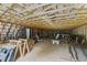 Spacious barn interior featuring wooden framework and ample space suitable for storage or equestrian needs at 108 Cedarwood Dr, Louisburg, NC 27549