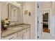 Bathroom featuring a neutral sink vanity, mirror, and decor at 108 Cedarwood Dr, Louisburg, NC 27549