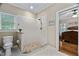 Modern bathroom with a tiled walk-in shower, complemented by neutral walls and fixtures at 108 Cedarwood Dr, Louisburg, NC 27549