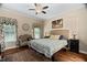 Cozy bedroom featuring an area rug, natural light, and a sitting area at 108 Cedarwood Dr, Louisburg, NC 27549