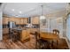 Open-concept kitchen adjacent to the dining area, offering a seamless flow for entertaining at 108 Cedarwood Dr, Louisburg, NC 27549