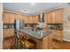 Bright kitchen boasting ample cabinetry and a functional center island with seating at 108 Cedarwood Dr, Louisburg, NC 27549