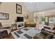 Comfortable living room with high ceilings and a cozy seating arrangement at 108 Cedarwood Dr, Louisburg, NC 27549