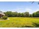 Expansive yard with wooden fence, perfect for recreation and outdoor activities at 108 Cedarwood Dr, Louisburg, NC 27549