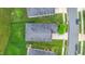 An aerial view showcases the home's roof, landscaping, and proximity to the neighborhood street at 1096 Aberlour Ln, Burlington, NC 27215