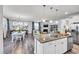 Open concept kitchen with a center island, connecting the living room and dining area creating great flow at 1096 Aberlour Ln, Burlington, NC 27215