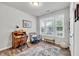 Bright office with a large window, desk, and a comfortable chair, ideal for working from home at 1096 Aberlour Ln, Burlington, NC 27215