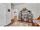 Functional office space with bookshelves, a desk, and natural light for a productive work environment at 1096 Aberlour Ln, Burlington, NC 27215