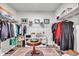 Large walk-in closet featuring shelving, hanging racks, and an organization system at 1096 Aberlour Ln, Burlington, NC 27215