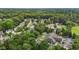 Community aerial view highlighting lush green surroundings, and recreation areas at 110 Fairchild Downs Pl, Cary, NC 27518