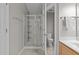 Bathroom featuring a glass enclosed shower, tiled floors, and neutral colored walls at 110 Fairchild Downs Pl, Cary, NC 27518