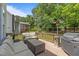 Outdoor deck featuring comfortable seating, a gas grill, and an outdoor heater for entertaining at 110 Fairchild Downs Pl, Cary, NC 27518