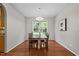 Formal dining room with dark wood table and lots of natural light at 110 Fairchild Downs Pl, Cary, NC 27518