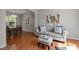 Inviting living room with hardwood floors and lots of natural light at 110 Fairchild Downs Pl, Cary, NC 27518