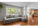 Spacious living room with hardwood floors and an open floor plan at 110 Fairchild Downs Pl, Cary, NC 27518
