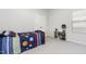 Bright bedroom with neutral carpet, overhead lighting, closet, and a window for natural light at 1101 Hazelmist Dr, Youngsville, NC 27596