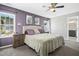 Comfortable primary bedroom with natural light, carpet, and ensuite bathroom at 111 Chancellors Ridge Dr, Durham, NC 27713