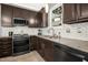 This kitchen showcases stainless steel appliances, a subway tile backsplash, and modern fixtures for a sleek cooking experience at 111 Chancellors Ridge Dr, Durham, NC 27713