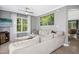 This living room boasts a comfortable sectional sofa, stylish decor, and access to other living spaces in the home at 111 Chancellors Ridge Dr, Durham, NC 27713