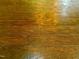 Rich hardwood floors show beautiful wood grain and shine, enhancing the interior's warmth at 114 Constitution Dr, Durham, NC 27705