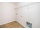 Clean laundry room with tiled floor and wire rack shelving at 114 Constitution Dr, Durham, NC 27705