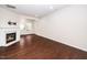 Cozy living room showcasing a fireplace and hardwood floors at 114 Constitution Dr, Durham, NC 27705