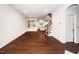 Open living space with hardwood floors flows seamlessly into the kitchen and dining areas at 114 Constitution Dr, Durham, NC 27705