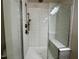 Walk in shower with white subway tile and built in bench at 114 Constitution Dr, Durham, NC 27705