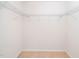 Walk-in closet featuring ample shelving for storage and organization at 114 Constitution Dr, Durham, NC 27705