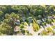 An aerial shot of homes surrounded by mature trees in a quiet, well-maintained neighborhood at 118 Brandi Dr, Rolesville, NC 27571