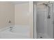 Bathroom with a large tub and shower area at 118 Brandi Dr, Rolesville, NC 27571