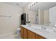 Bathroom with a double vanity and framed mirror, providing ample space at 118 Brandi Dr, Rolesville, NC 27571