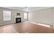 Open living room features a fireplace, tile flooring, and neutral paint at 118 Brandi Dr, Rolesville, NC 27571