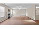 Spacious living room with fireplace and tile floors offers ample natural light at 118 Brandi Dr, Rolesville, NC 27571