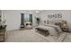 Main bedroom features stylish decor, a ceiling fan, and neutral carpet at 118 Brandi Dr, Rolesville, NC 27571